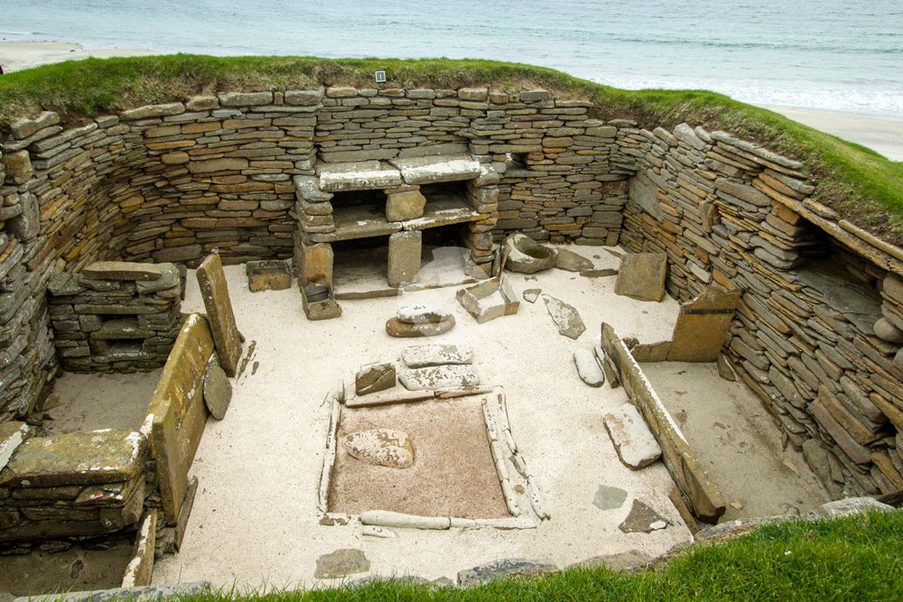Photo of Skara brae interior showing stone dresser and hearth